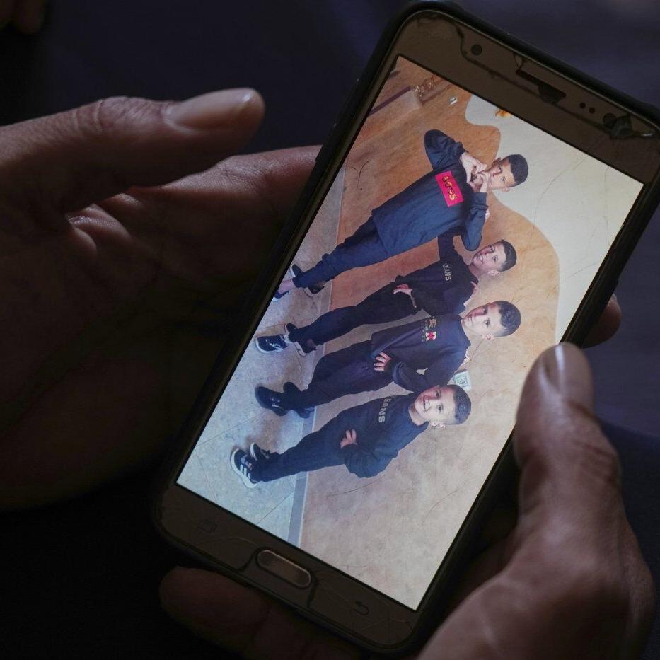 A father mourns 2 sons killed in an Israeli strike as hunger worsens in Gaza